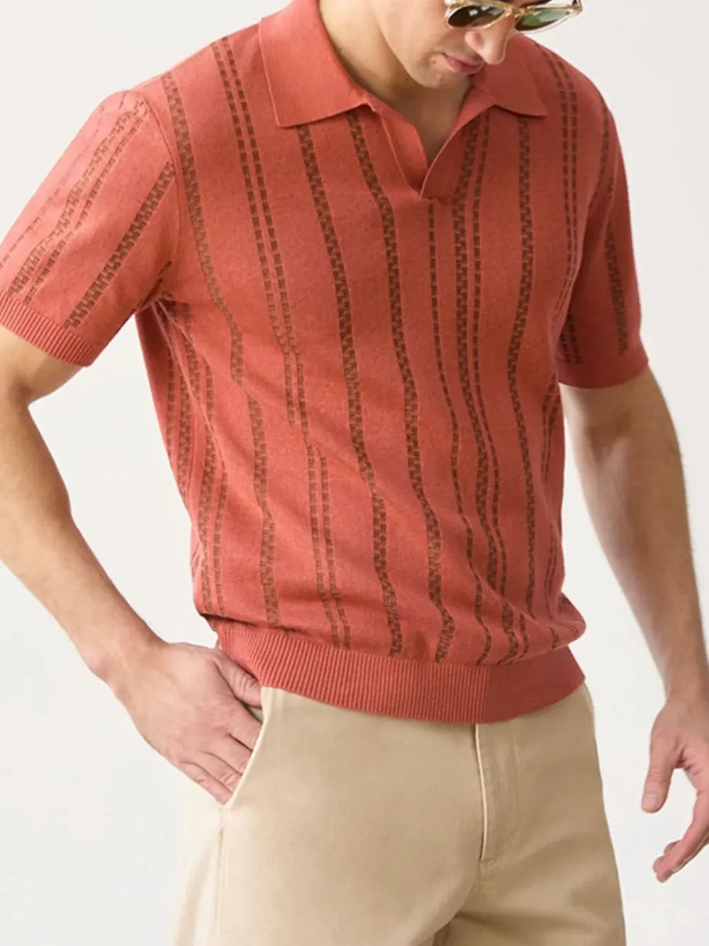 Orange-red knit polo shirt with vertical stripe pattern for big and tall guys.