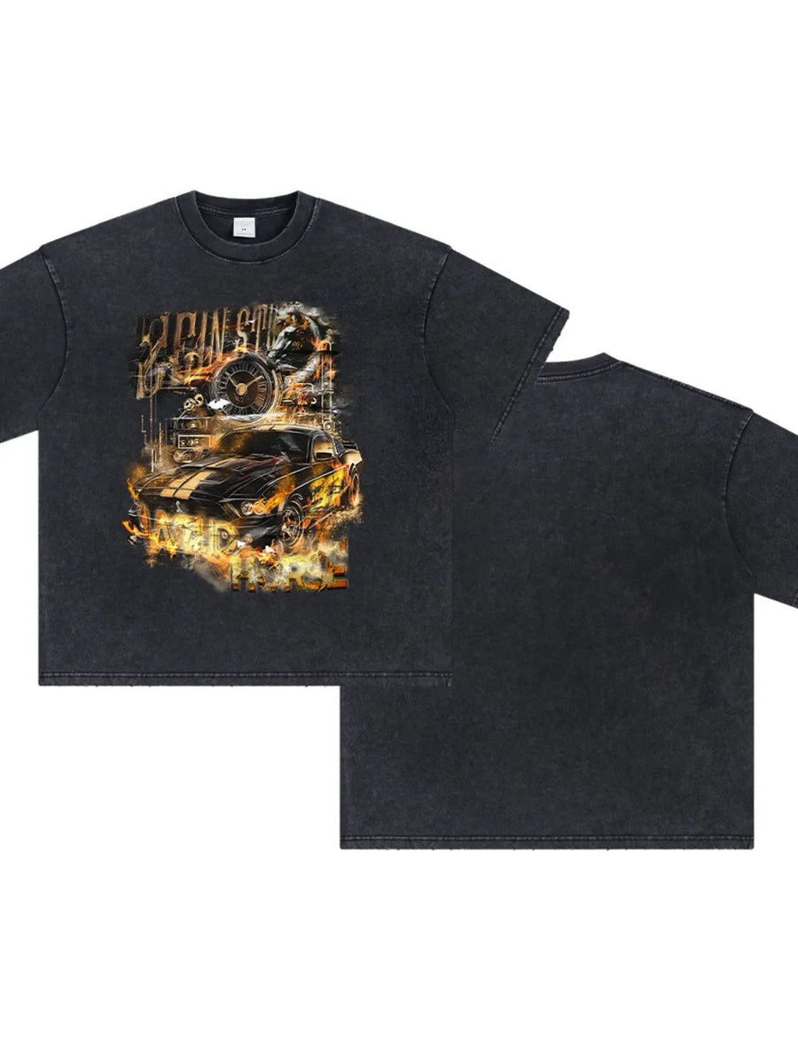 Black vintage wash graphic tee with flaming racing car motif and text.