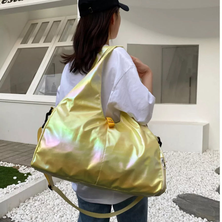 Iridescent pastel yellow PVC large capacity convertible bag with adjustable strap.