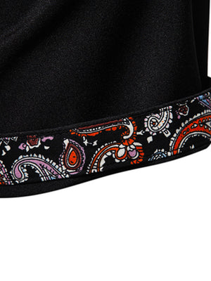 Black cotton blend shirt with colorful paisley trim detail on the hem.