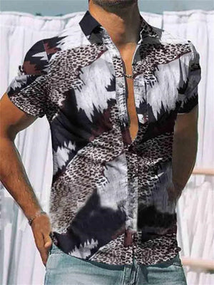 Short sleeve button-down shirt with bold abstract and animal print in black, white, and brown.