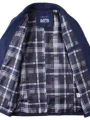 Dark blue denim blazer with plaid lining and notched lapels.