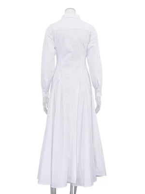 White cotton shirt dress with long sleeves and a full skirt
