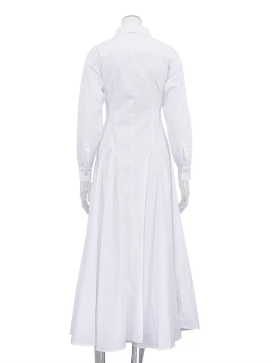 White cotton shirt dress with long sleeves and a full skirt