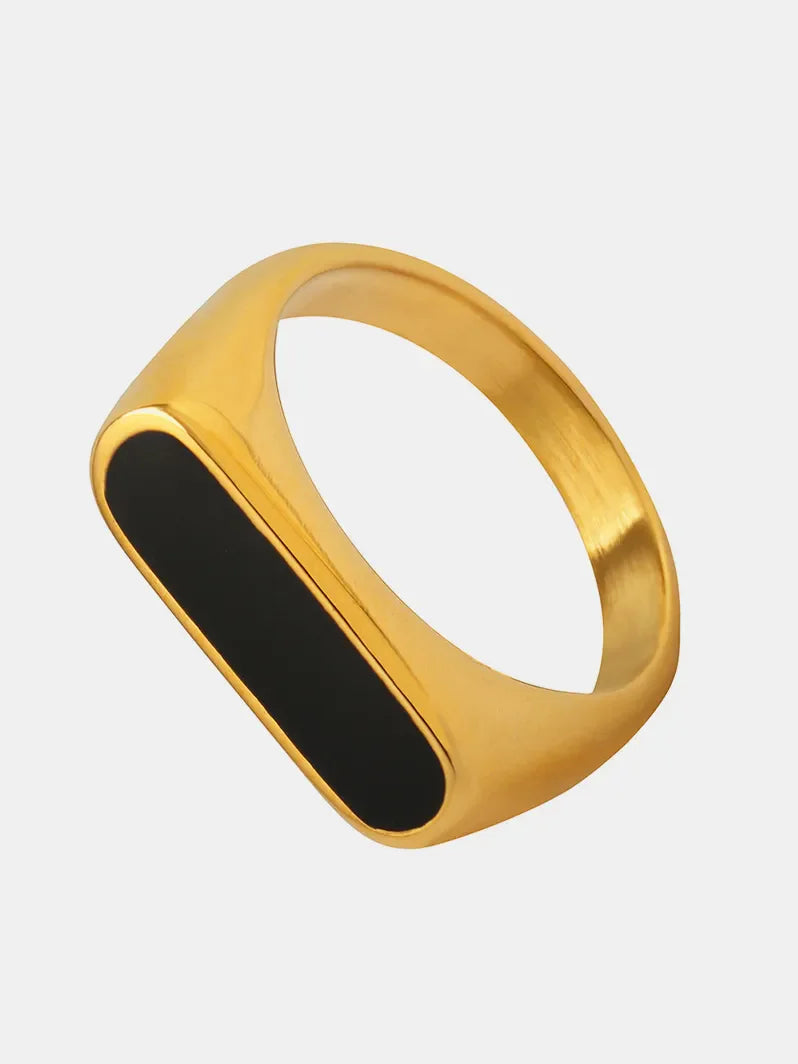 Gold rectangular signet ring with black enamel inlay