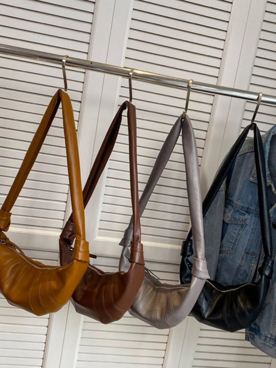 Chic Crescent Hobo Crossbody Bag in brown, grey, and black with curved stitching detail