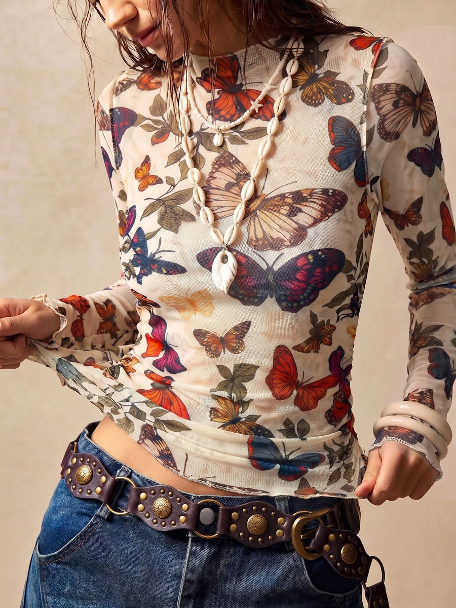 orange t-shirt featuring mesh and butterfly-print