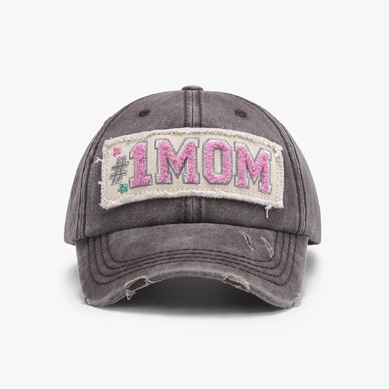 Gray distressed baseball cap with #1 MOM patch and pink lettering