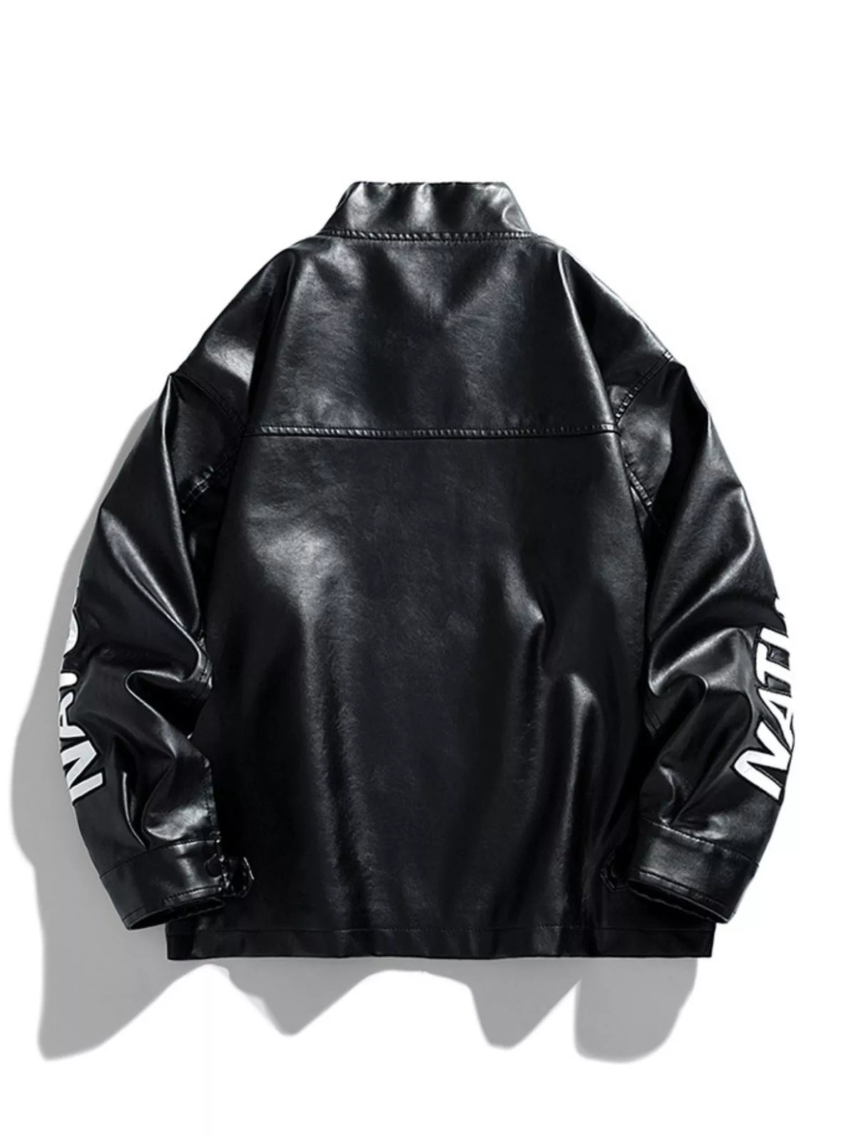 Black oversized leather jacket with white text detail on sleeve.