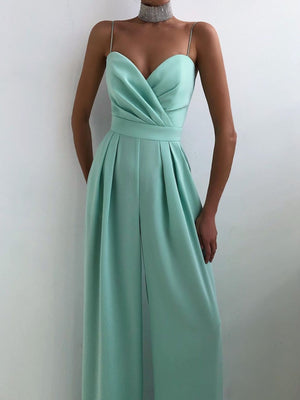 Mint green ruched spaghetti strap wide-leg jumpsuit with sweetheart neckline and pleats.