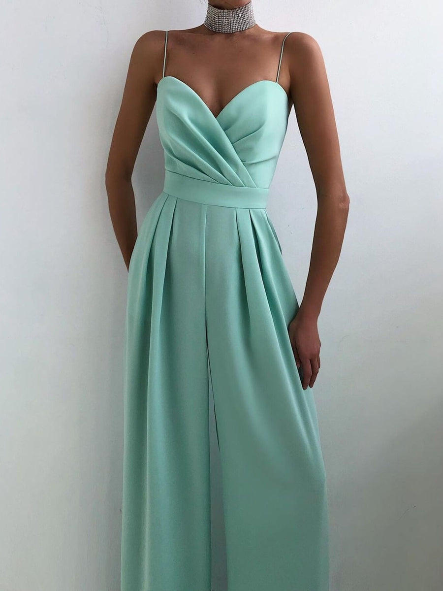 Mint green ruched spaghetti strap wide-leg jumpsuit with sweetheart neckline and pleats.
