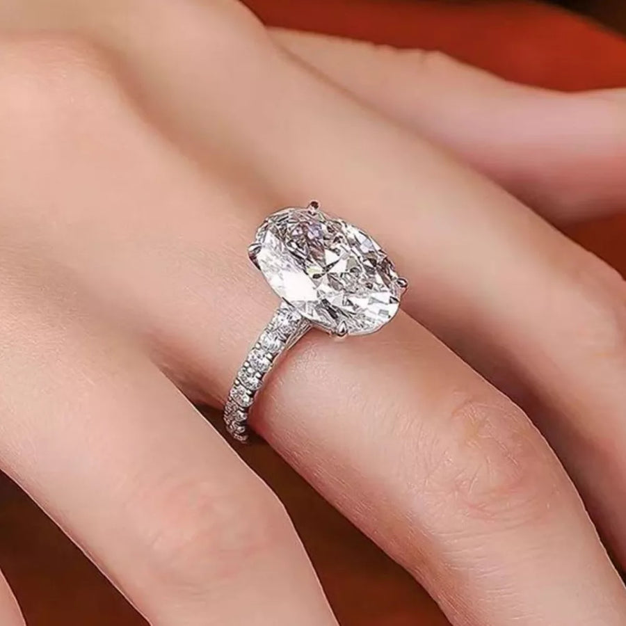 Elegant Moissanite Oval Ring in Sterling Silver with pave band