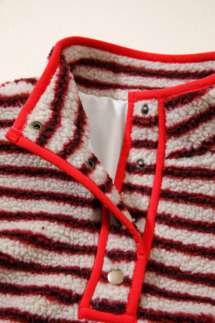 burgundy sweatshirt with fuzzy texture and long sleeve