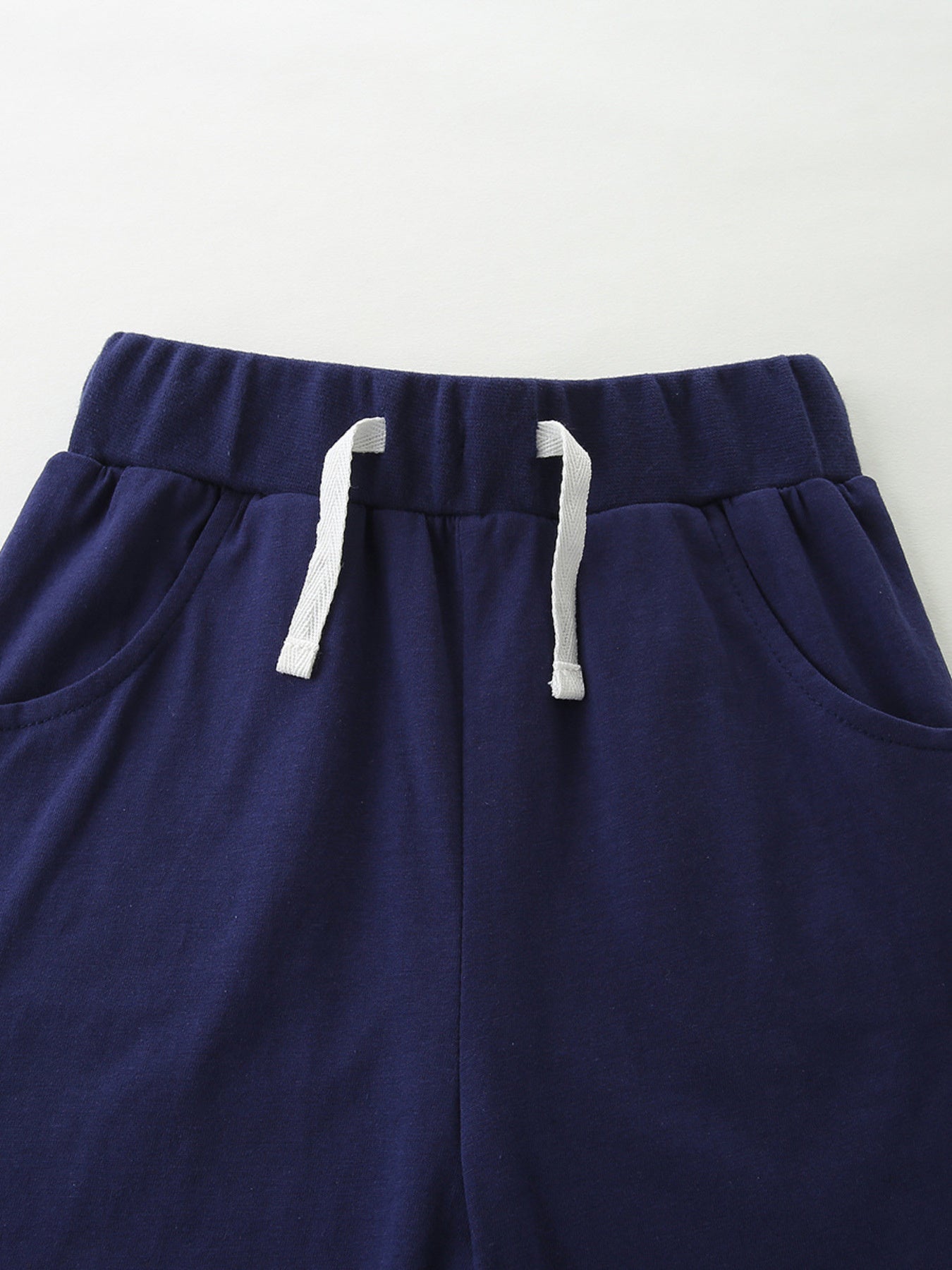 Navy cotton baby pants with drawstring and pockets