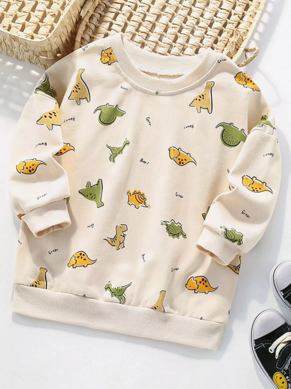 Baby beige cotton crew neck sweatshirt with allover dinosaur print
