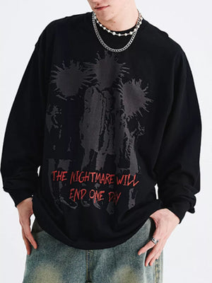 Black oversized long sleeve t-shirt with graphic print and red text.