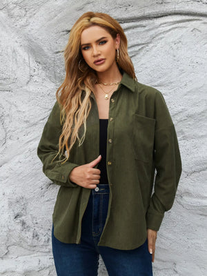 Olive green corduroy button-up overshirt with chest pocket and classic collar.