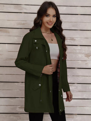 Military green drawstring trench coat with snap-down details and a plaid lining.