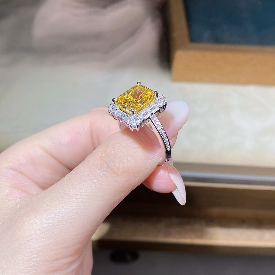 yellow ring featuring zircon gemstone and geometric