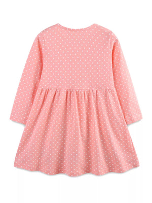Pink polka dot long sleeve dress with gathered waist and flared skirt.