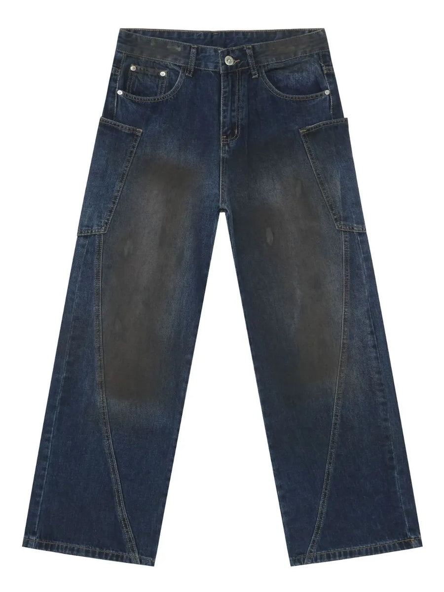 Faded panel wide-leg denim jeans in medium wash with a relaxed fit.