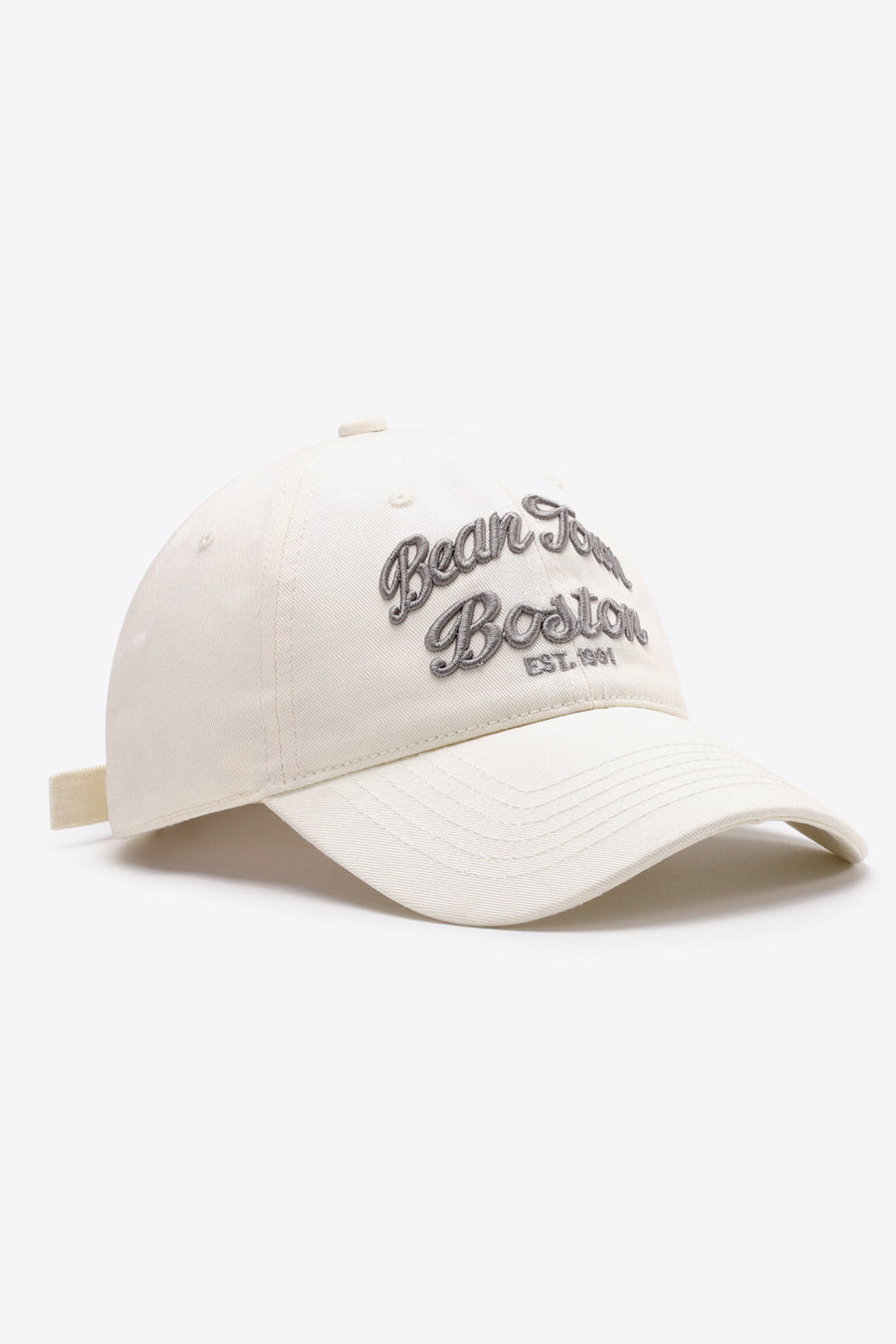 Ivory baseball cap with embroidered "Bean Town Boston Est. 1991" text.