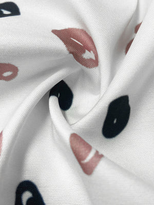 black button-down shirt featuring buttoned and abstract-spot