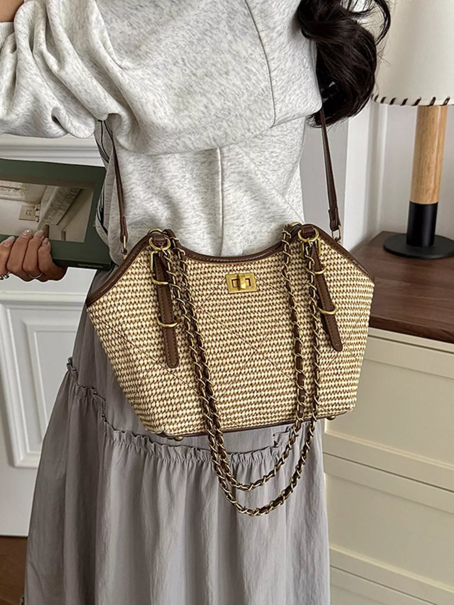 dark brown crossbody bag featuring woven texture and geometric