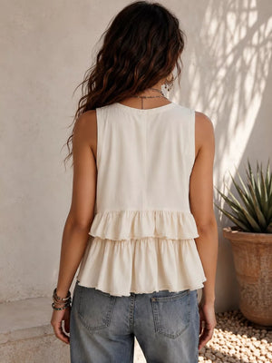 White ruffled V-neck tank top with tiered hem detail.