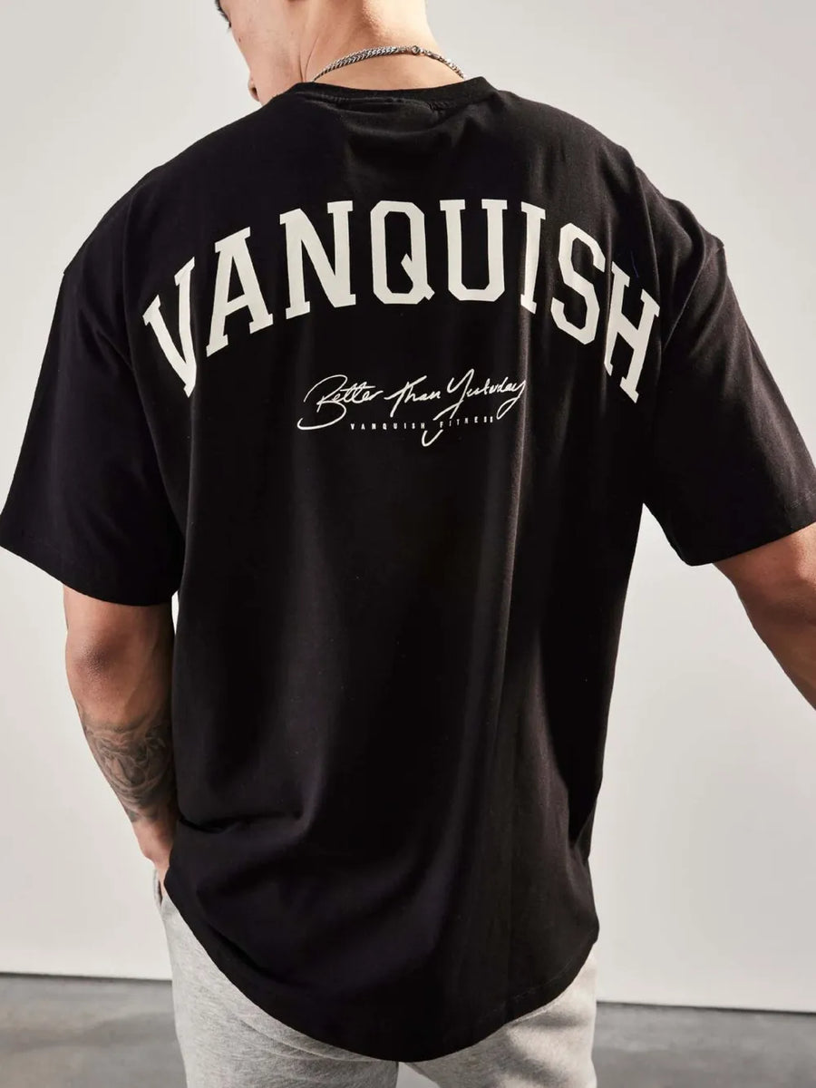 Black oversized graphic tee with "Vanquish" and "Better Than Yesterday" back print