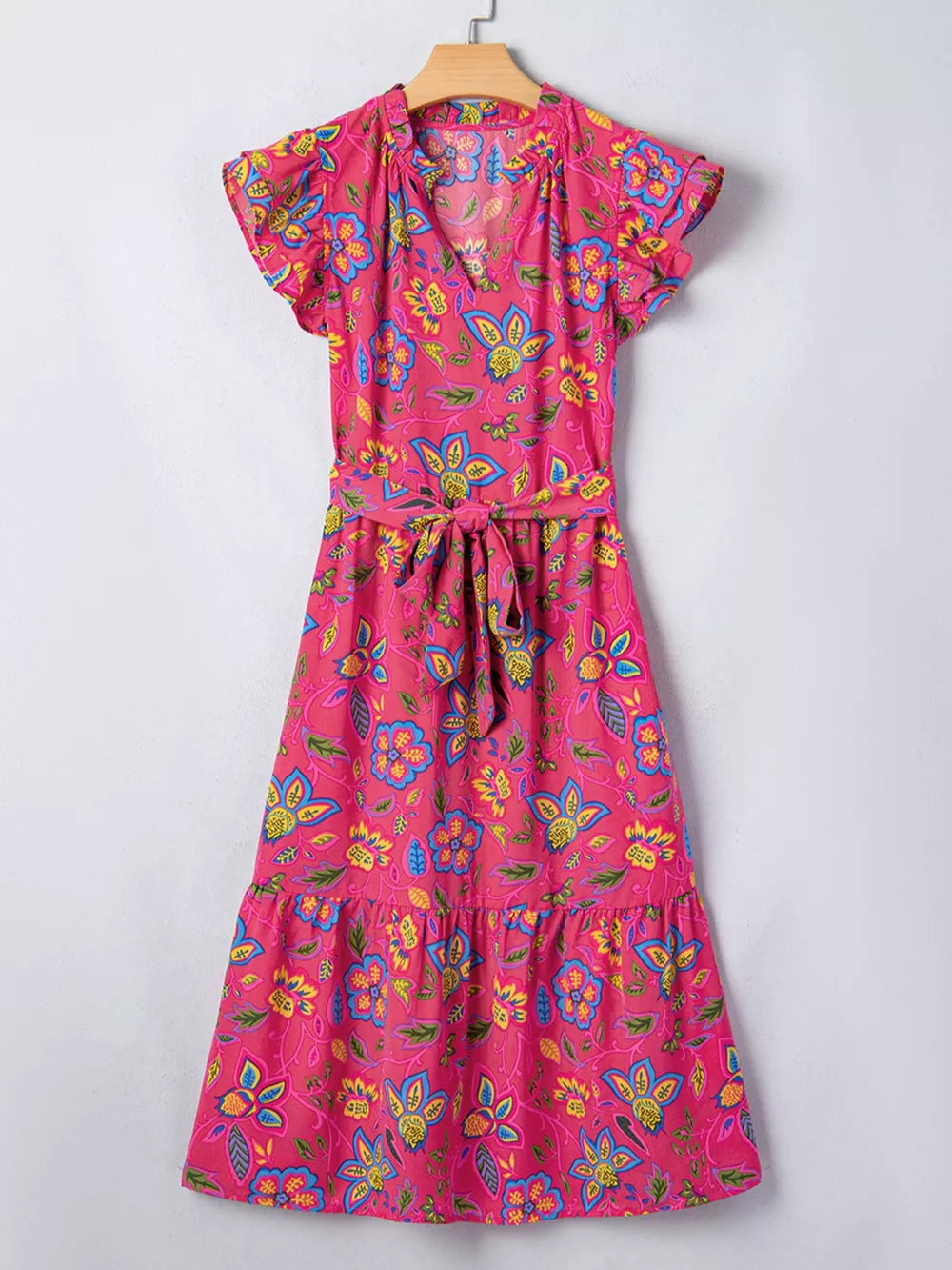 Floral midi dress with ruffled sleeves, V-neck, tie waist, and tiered hem in cotton blend.