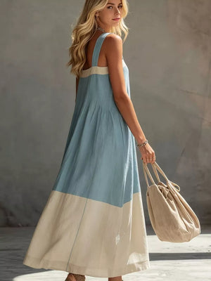 cream midi dress featuring wide straps and color-block
