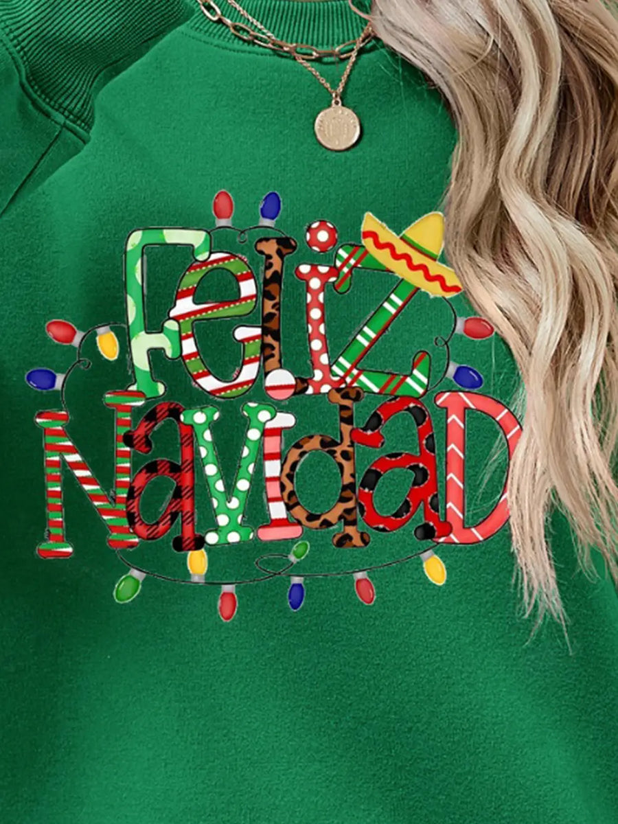 Green Feliz Navidad graphic sweatshirt with festive lights and a sombrero detail.