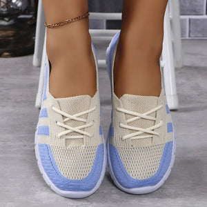Breathable knit lace-up sneakers in beige and light blue with white laces.