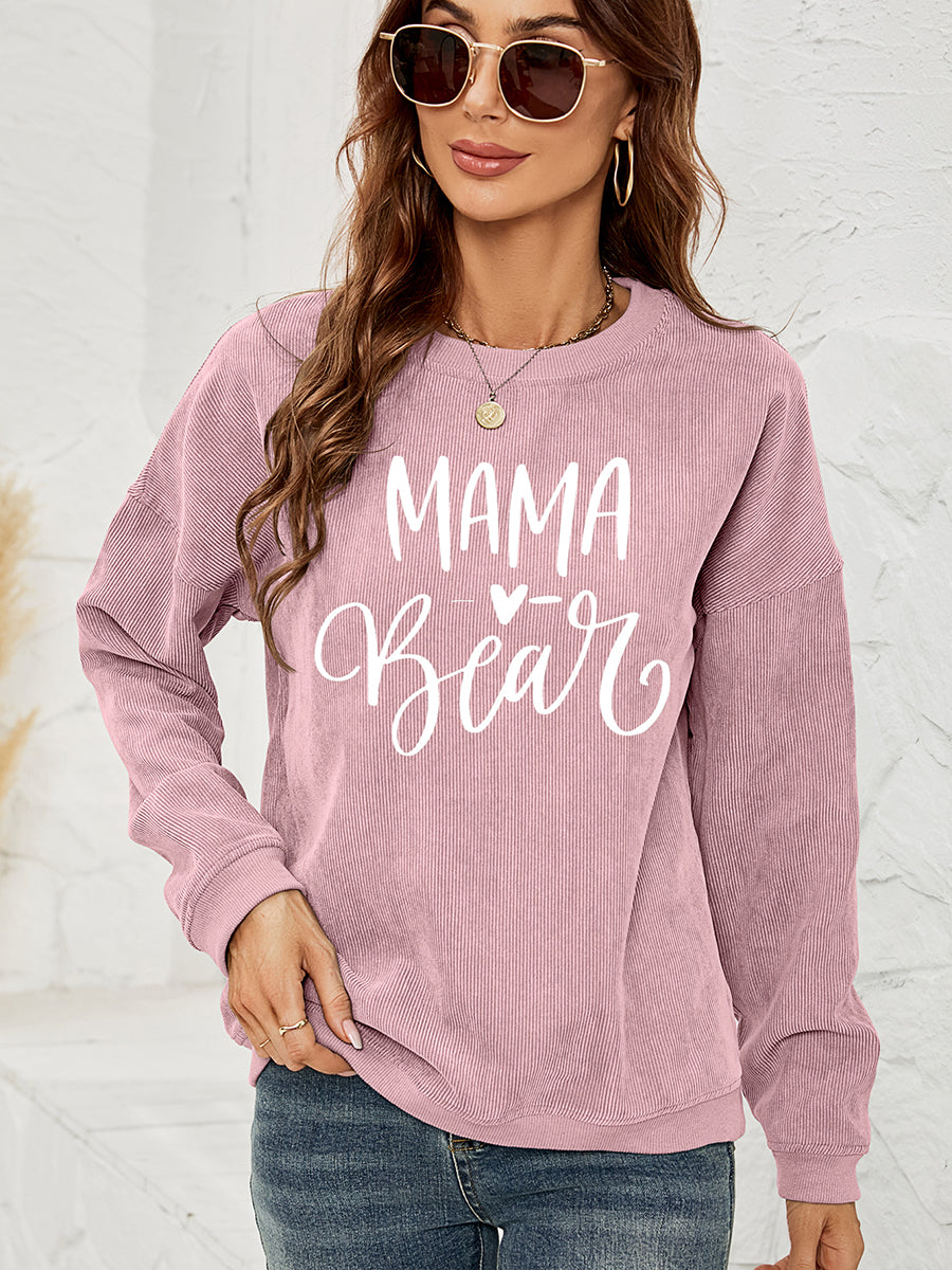 Dusty Pink textured corduroy sweatshirt with white "Mama Bear" graphic, crew neck, long sleeves.