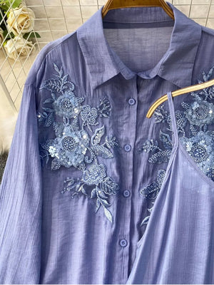 Blue embroidered floral two-piece set with sequin details and collared shirt.