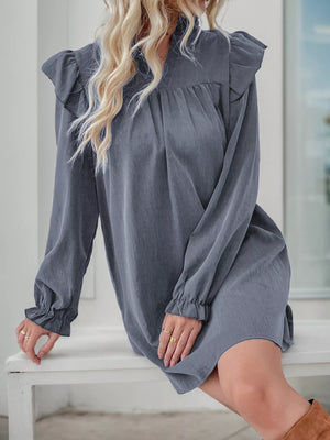 Dark gray cotton blend ruffled notched sleeve dress with cinched cuffs.