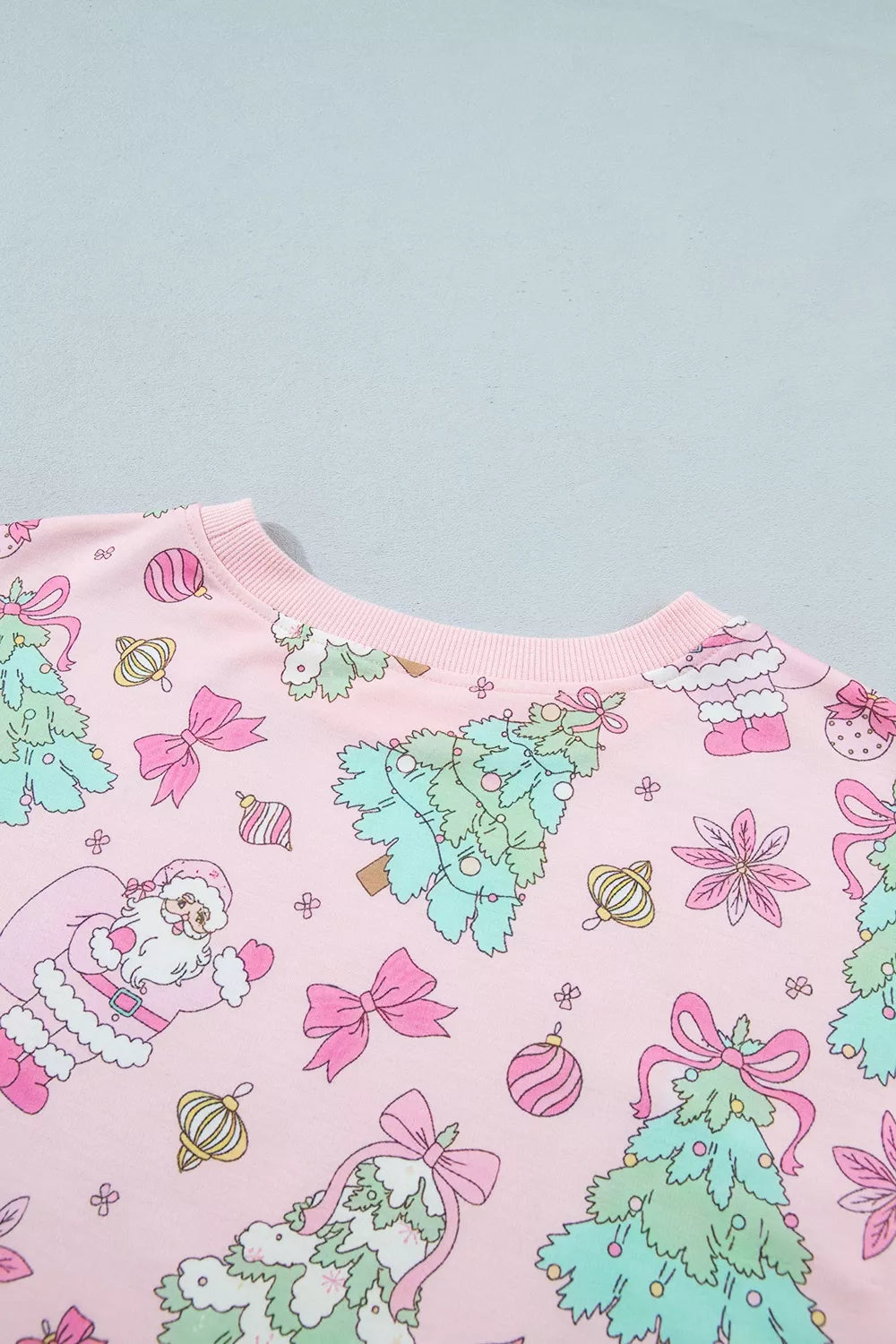pink pajama set with elastic waist and long sleeve