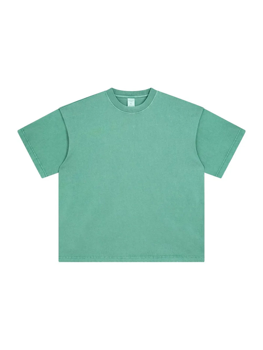 Oversized washed cotton tee in Gum Leaf green with relaxed fit and crew neck.