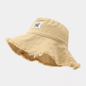 Frayed Hem Bucket Hat in mustard yellow with frayed hem