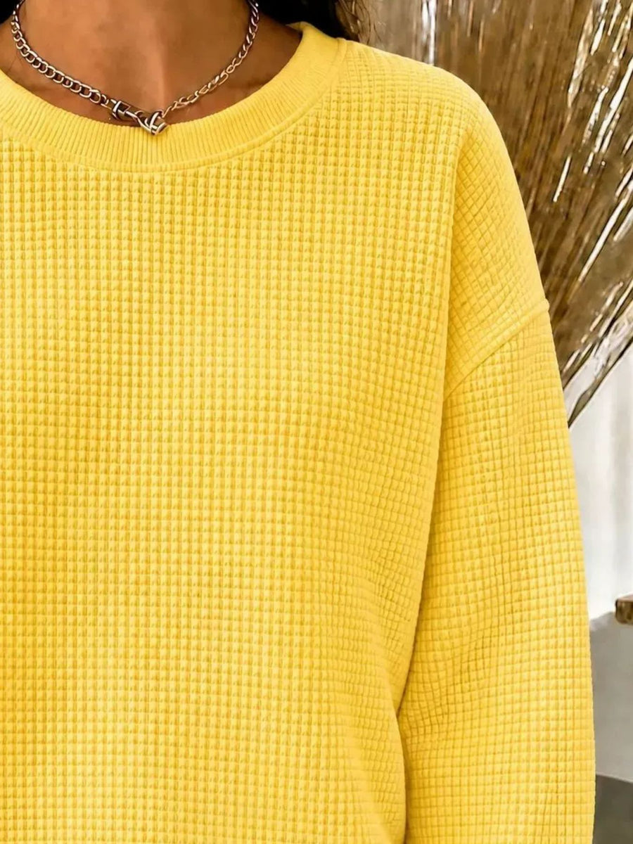 Yellow sweatshirt featuring waffle-knit and waffle knit