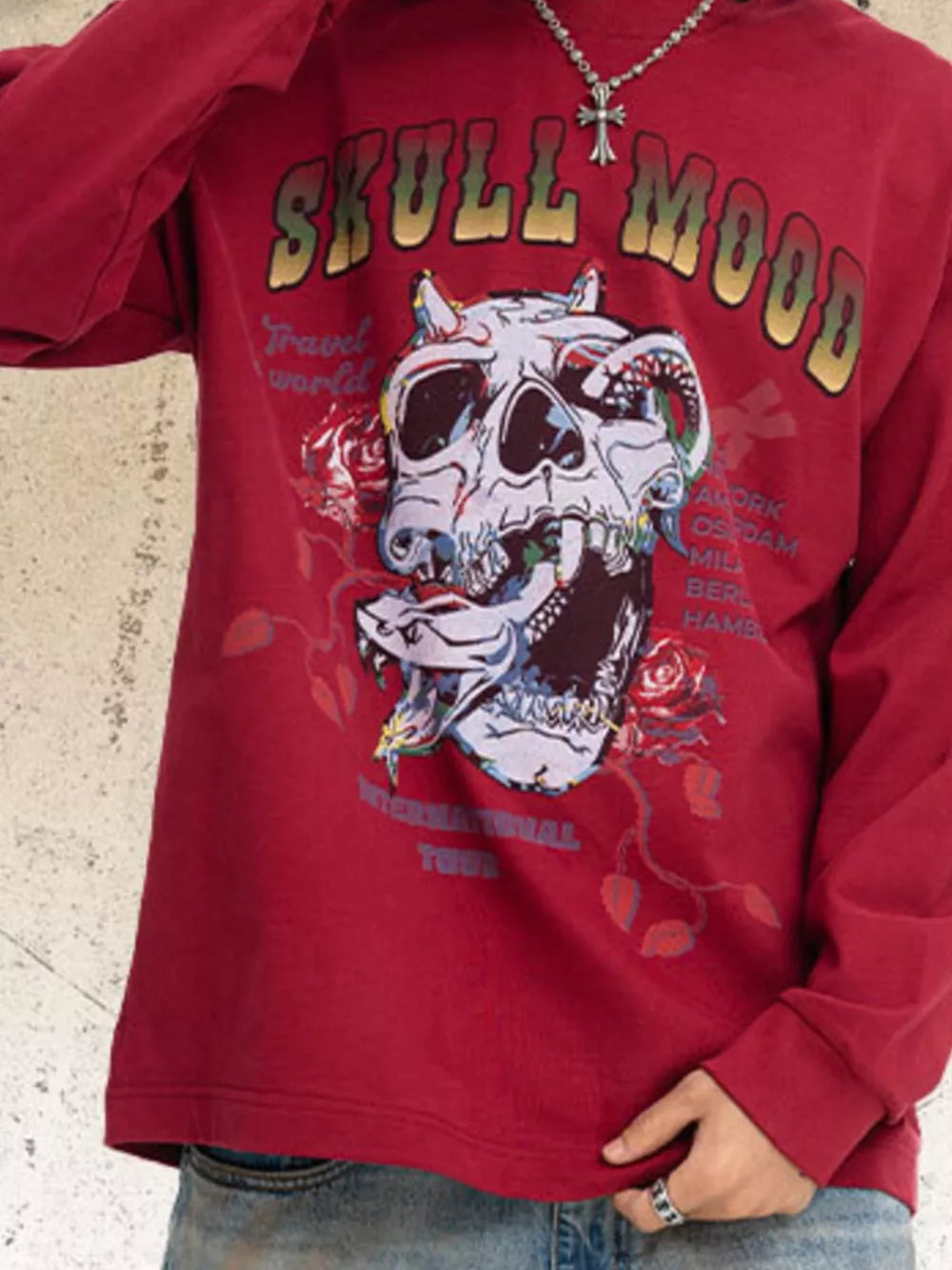 Red long sleeve t-shirt with skull and rose graphic print and "SKULL MOOD" text.