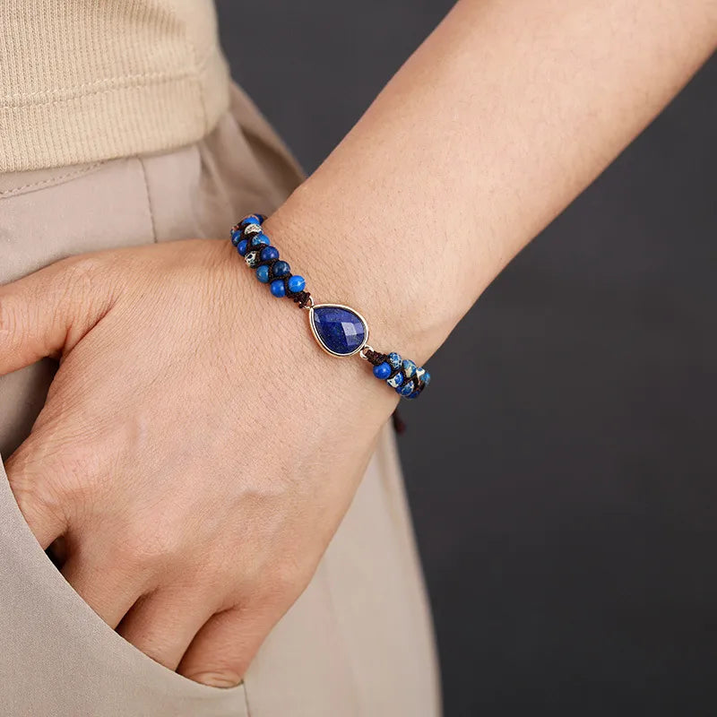 Lapis Lazuli macrame bracelet with teardrop pendant in royal blue.