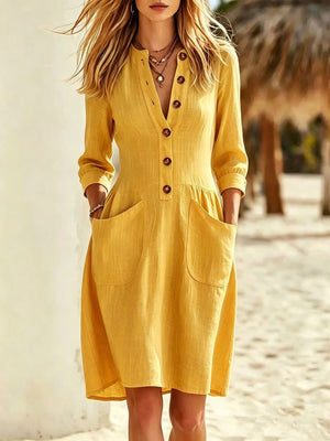 shirt dress in mustard yellow featuring buttoned and A-line fit