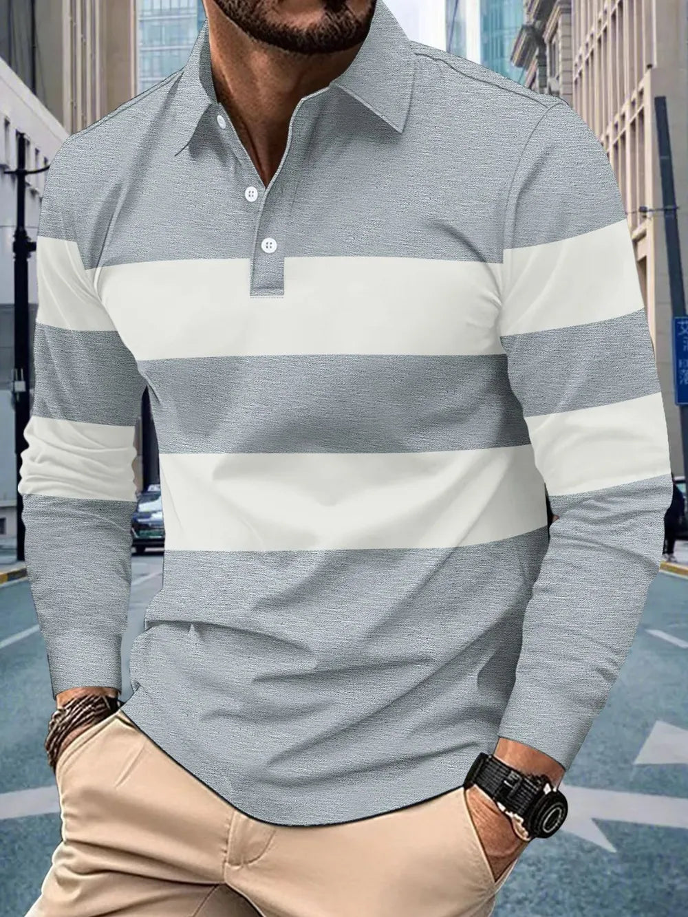Horizontal stripe long sleeve polo shirt in gray and white with a buttoned collar.