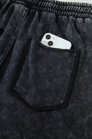 barrel pants in Black with mineral wash and full-length