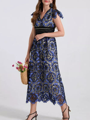 Blue floral lace midi dress with V-neck, cap sleeves, and black waistband.