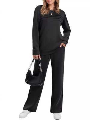 Black casual long-sleeve top and pants set with pleated detail on the neckline.
