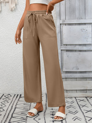 Khaki drawstring wide-leg pants with elastic waistband and pockets.