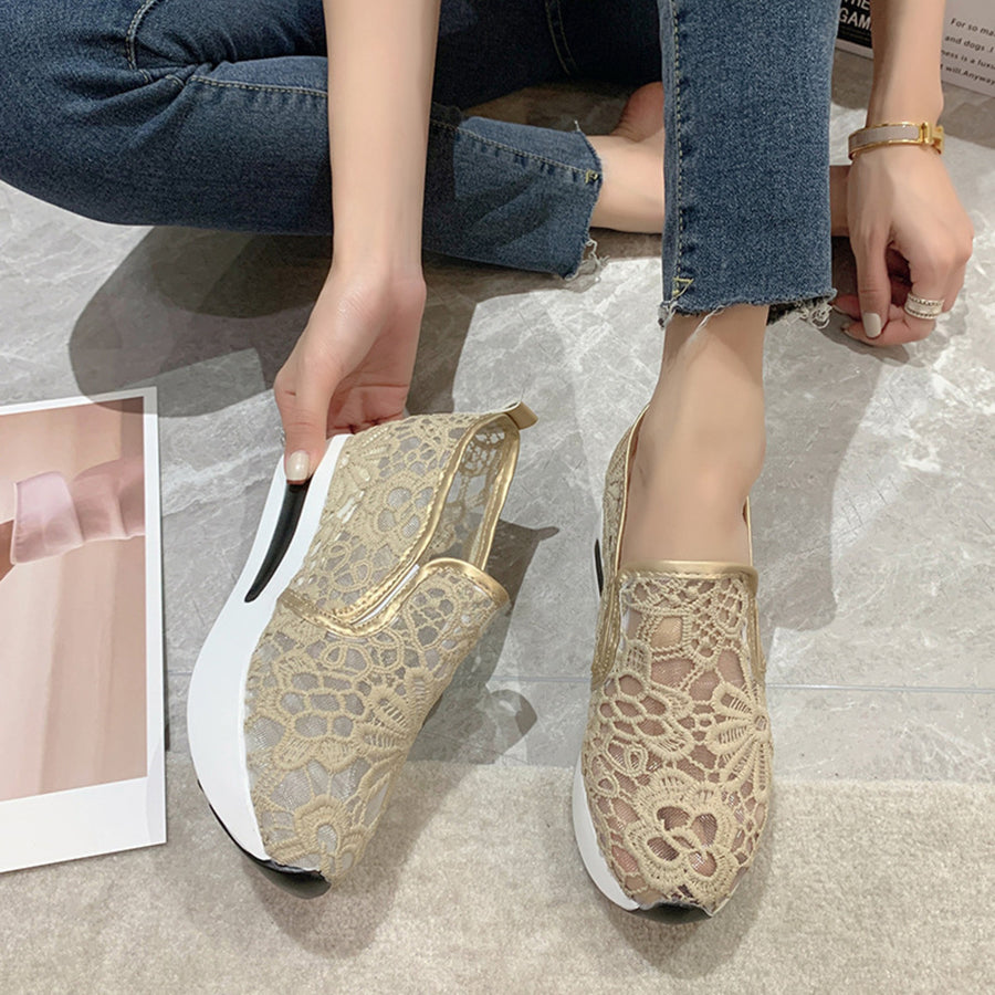 Khaki lace mesh slip-on flats with white soles and gold trim.